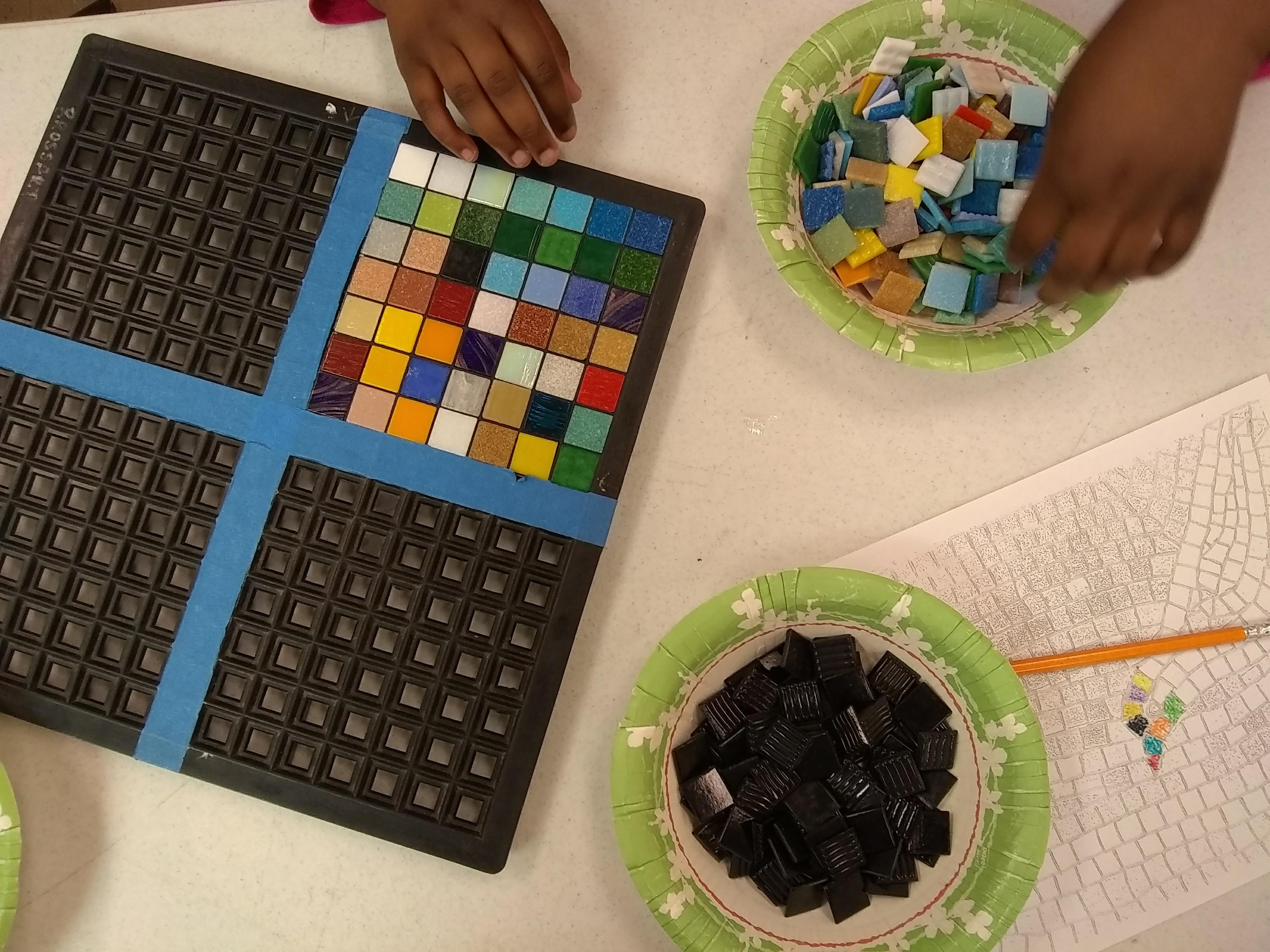 Students exploring pixel tile mosaic art and math workshop with Jeannette Brossart, NC